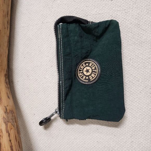 Kipling Handbags - Kipling multi pocket wristlet green